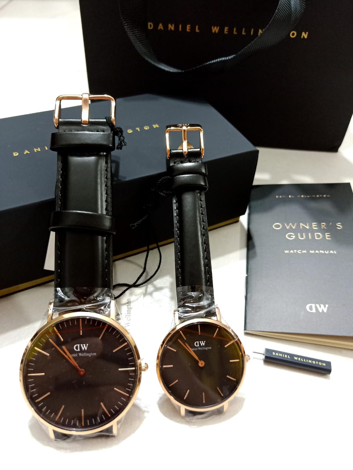 Daniel Wellington black belts couple watches